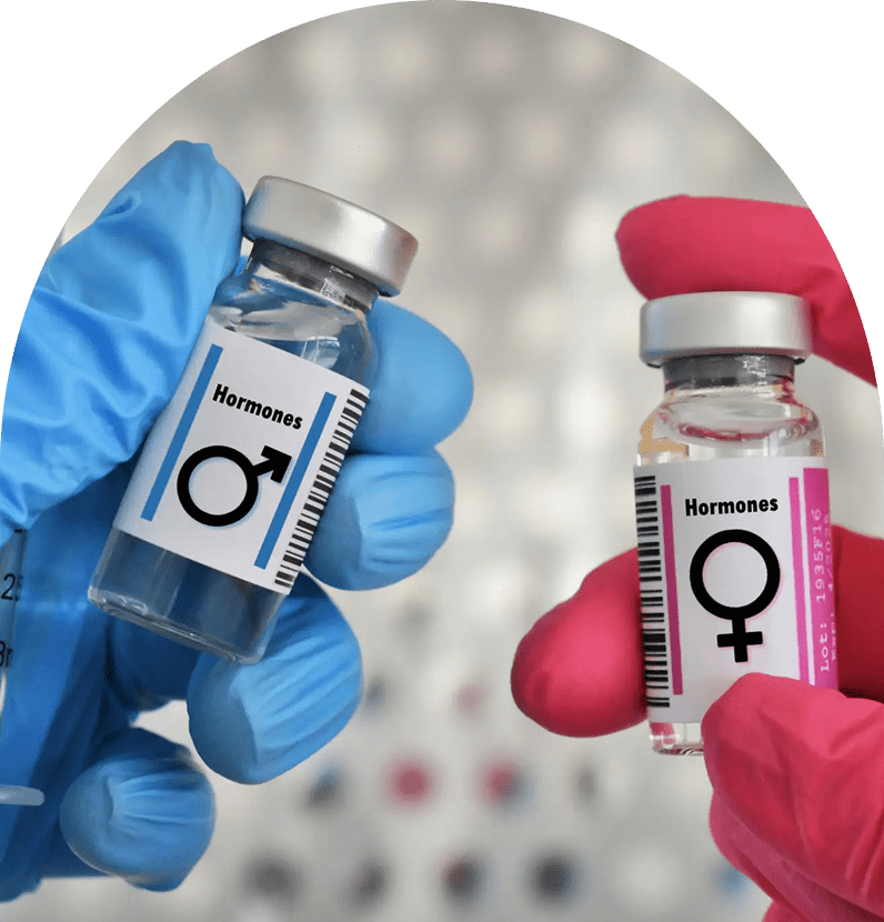 Male and female hormone vials in gloves
